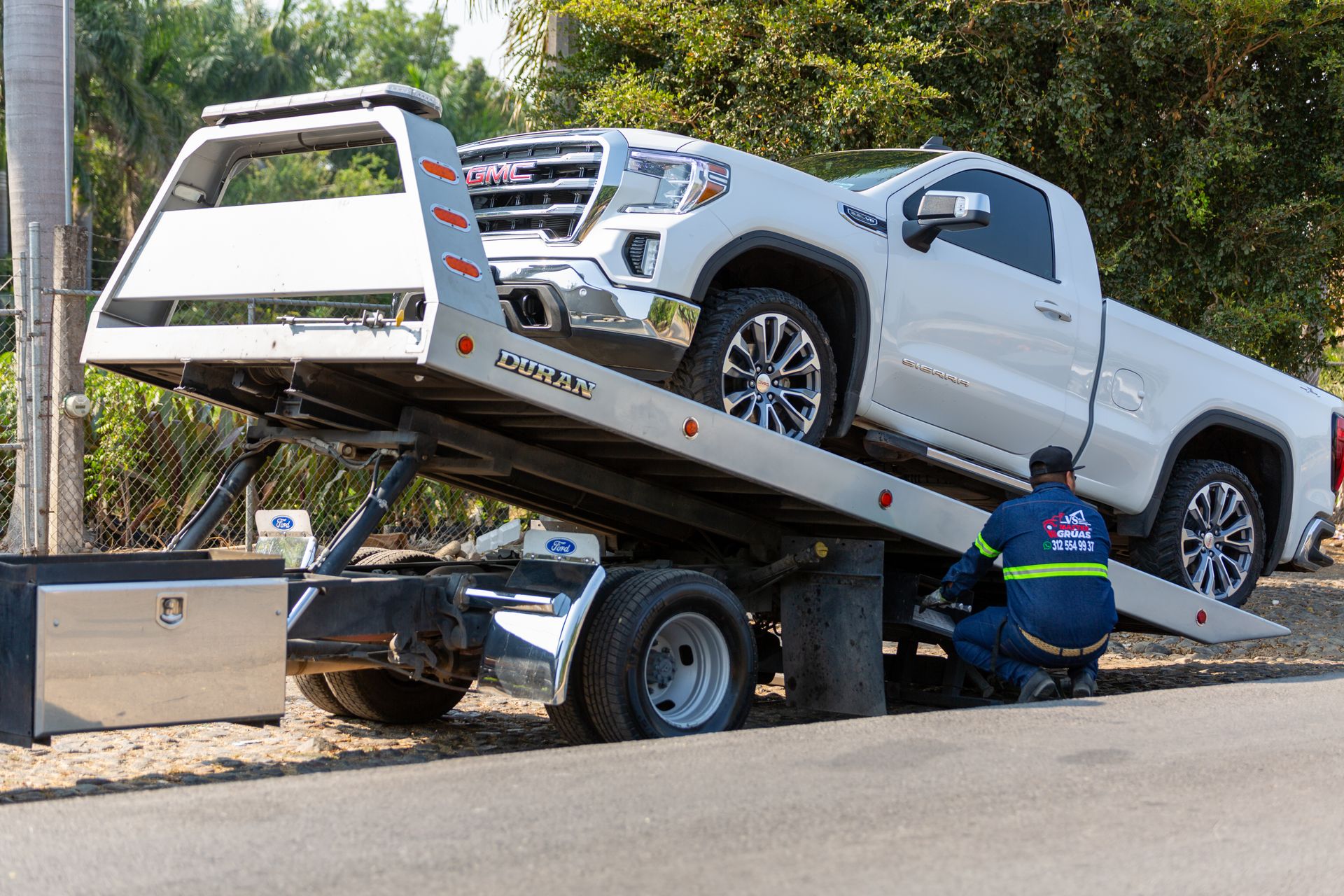 Tow truck loading a car