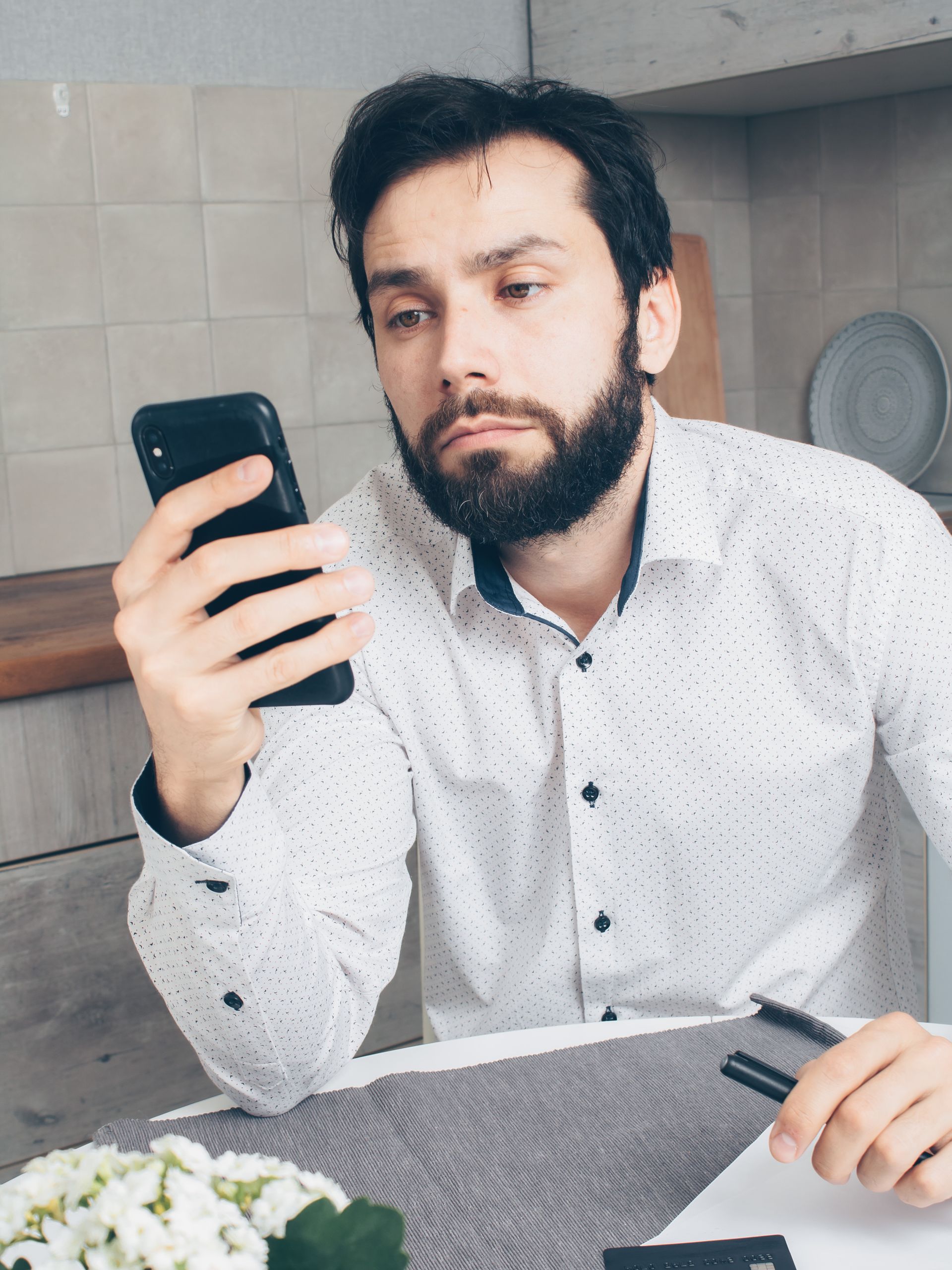 Man on a phone call about his account