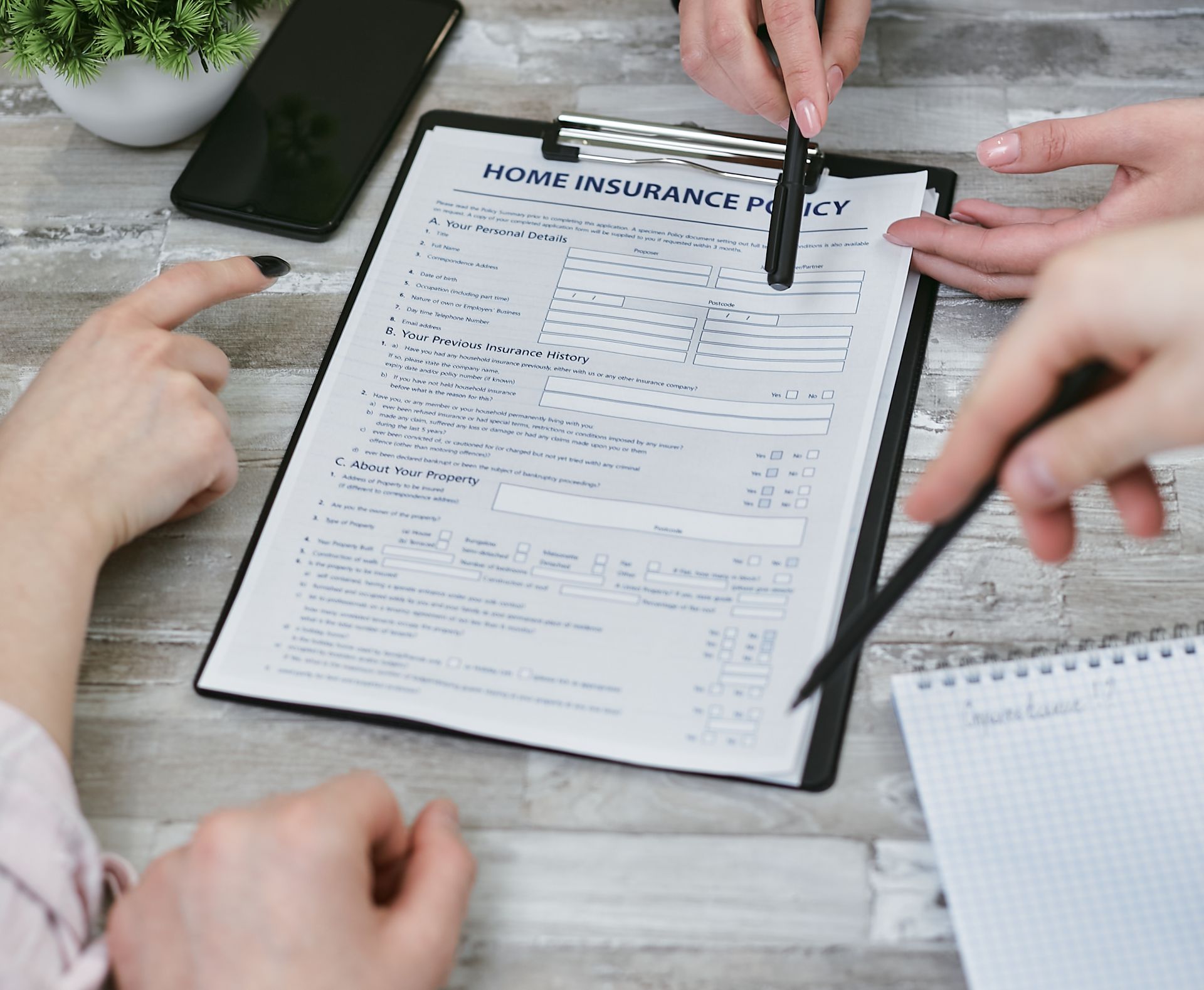 Signing an insurance claim form