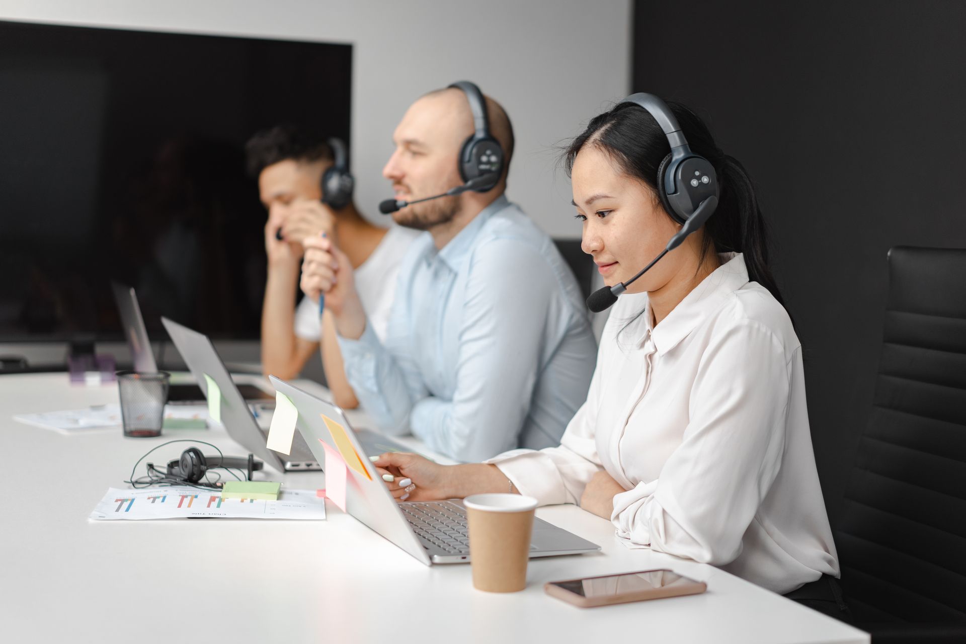 Customer support team with headsets
