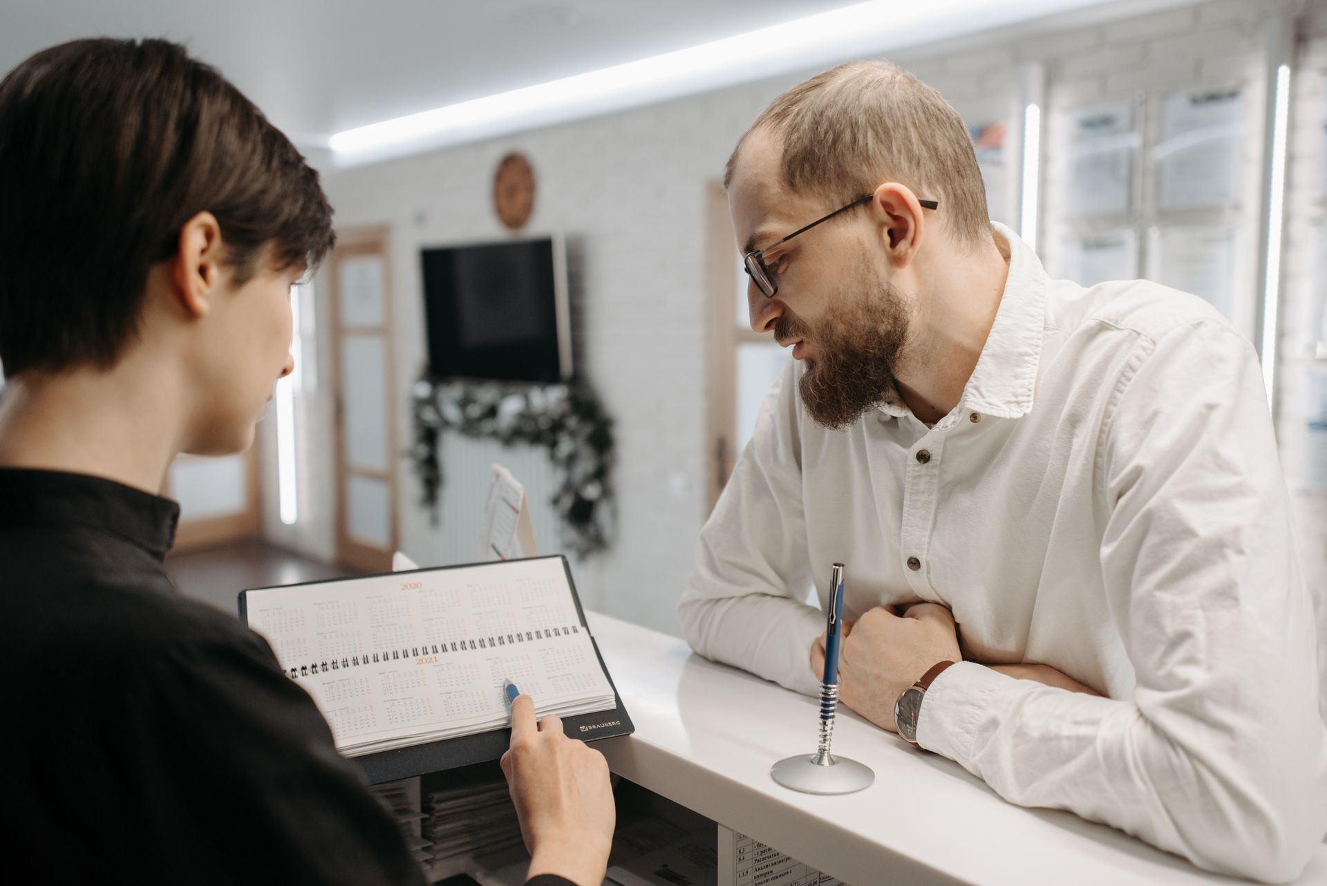 Receptionist booking a patient appointment