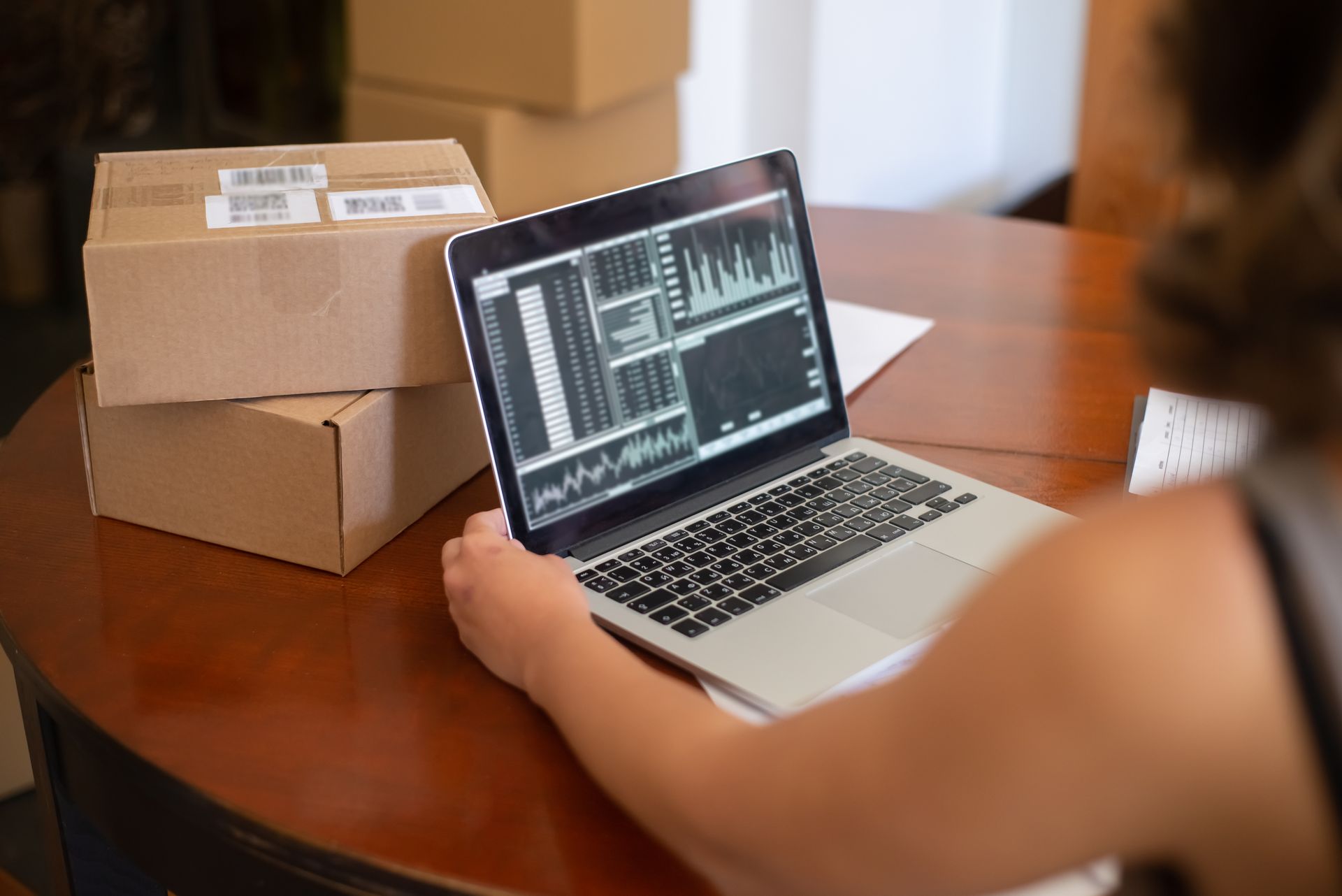 Small business owner managing online orders