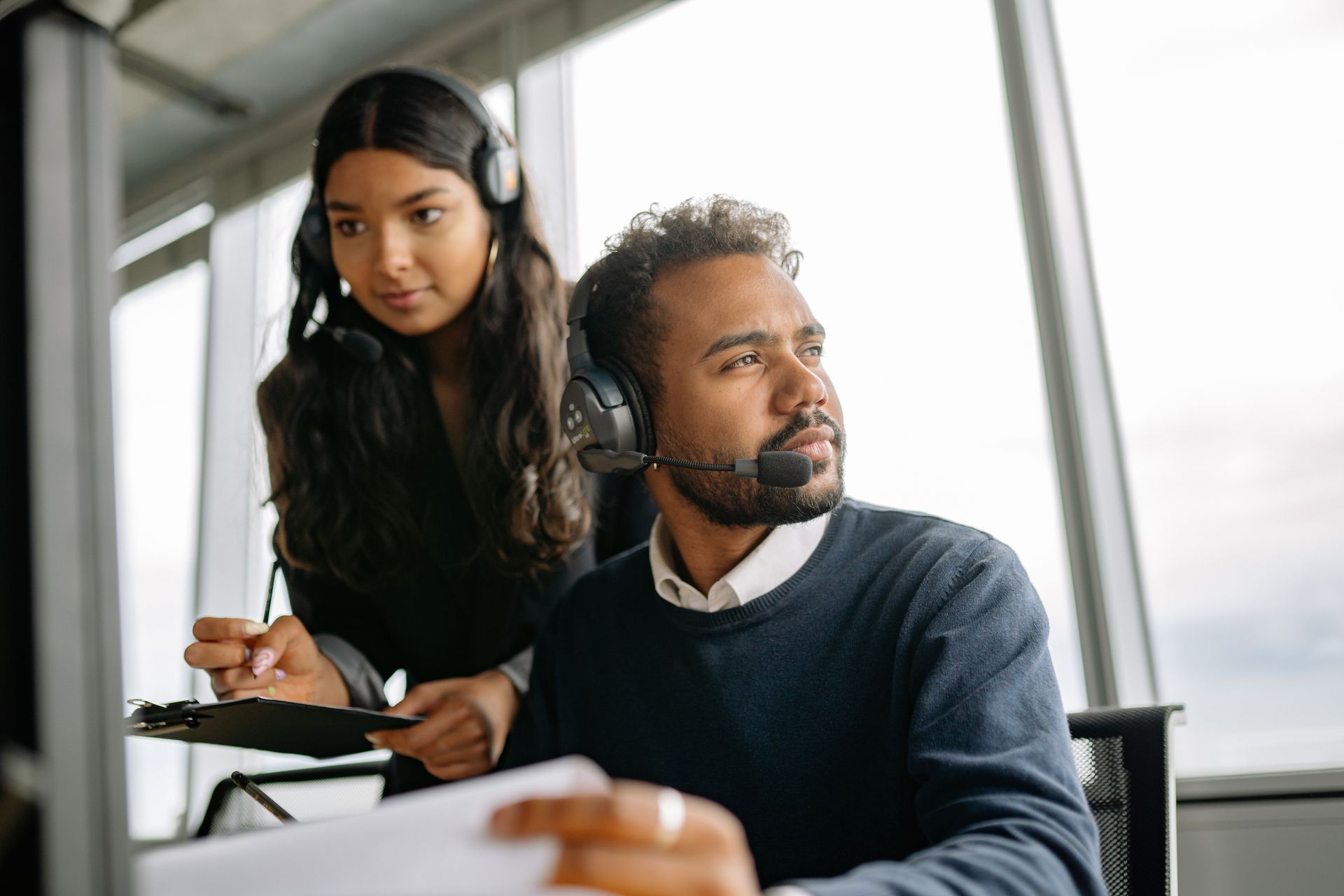 Sales agents reviewing results together