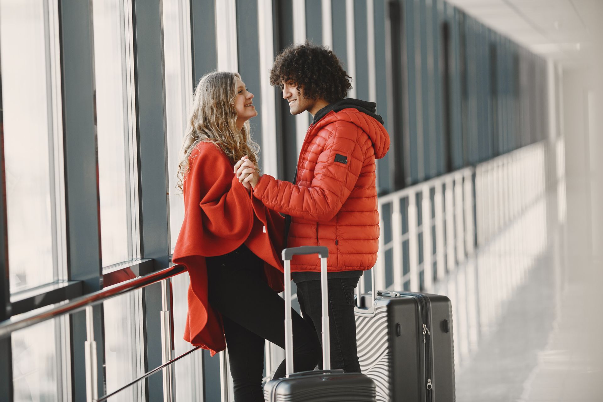 Couple with luggage at the airport