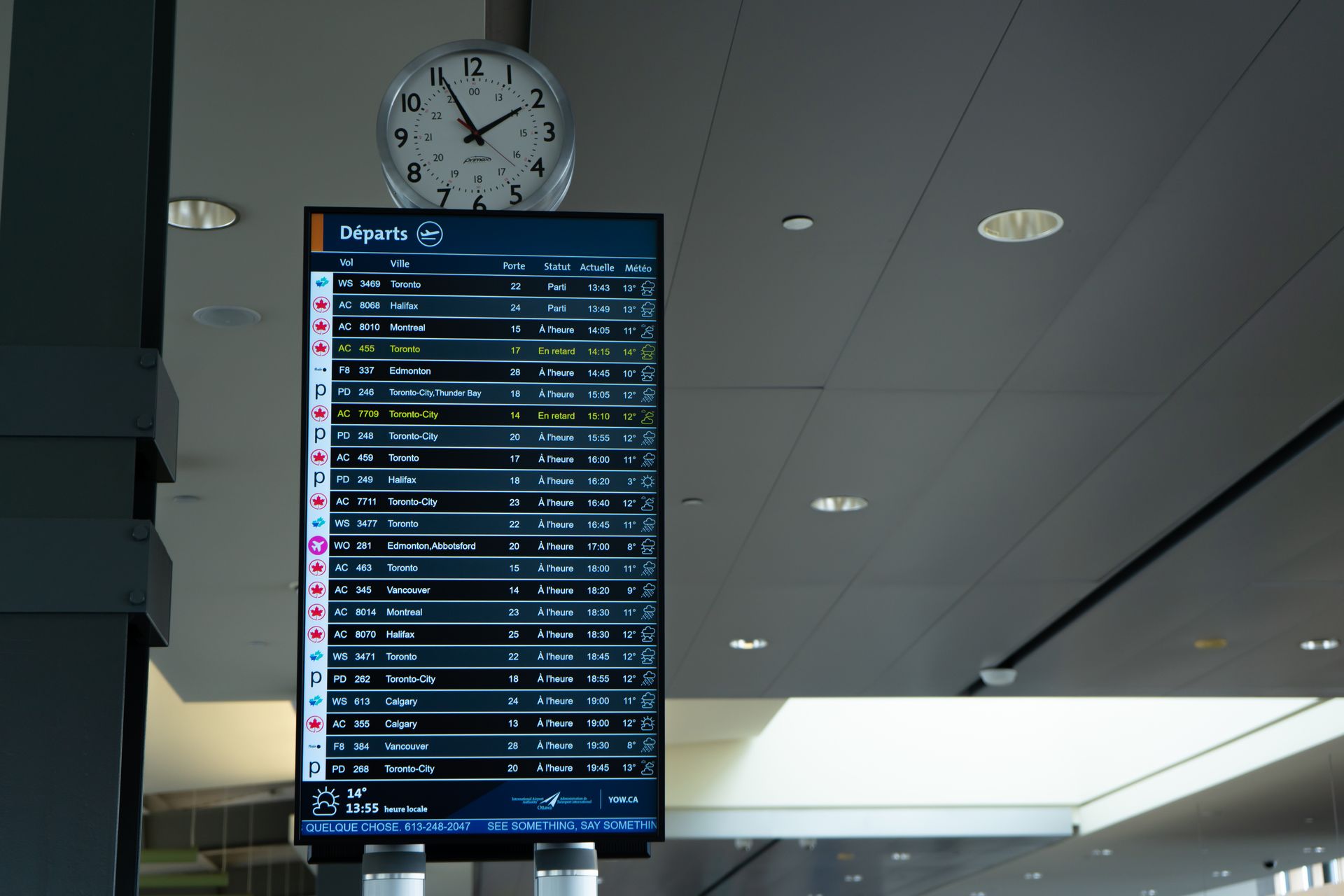Flight schedule screen at an airport